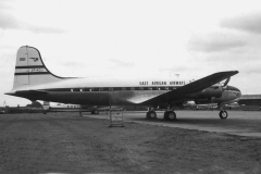 VP-KOJ seen at Heathrow(?). The livery was later changed to a plain white tail with registration and EAA lion symbol.