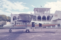 5X-UVN at Zanzibar, date unknown. This is one of the “long nose” series 200 version, which had extra luggage area.  photo by Tony Russell